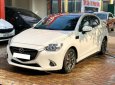 Mazda 2 2016 - Cần bán lại xe Mazda 2 đời 2016, màu trắng xe nguyên bản