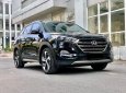 Hyundai Tucson   2018 - Cần bán Hyundai Tucson đời 2018, màu đen còn mới, giá tốt