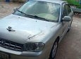 Kia Spectra 2004 - Cần bán gấp Kia Spectra 2004, màu bạc xe nguyên bản