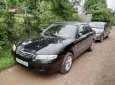 Mazda 6 2002 - Cần bán gấp Mazda 6 đời 2002, màu đen, nhập khẩu nguyên chiếc chính hãng