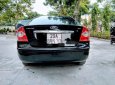 Ford Focus 2005 - Cần bán xe Ford Focus sản xuất năm 2005, màu đen xe nguyên bản