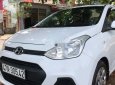 Hyundai Grand i10 2015 - Cần bán gấp Hyundai Grand i10 đời 2015, màu trắng, xe nhập xe gia đình