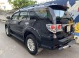 Toyota Fortuner 2013 - Cần bán lại xe Toyota Fortuner năm 2013, màu đen ít sử dụng