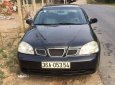 Daewoo Lacetti 2004 - Cần bán lại xe Daewoo Lacetti sản xuất năm 2004, màu đen