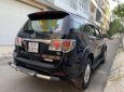 Toyota Fortuner 2013 - Cần bán lại xe Toyota Fortuner năm 2013, màu đen ít sử dụng