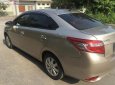 Toyota Vios 2018 - Cần bán gấp Toyota Vios 1.5E năm 2018, màu vàng, xe gia đình