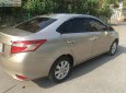 Toyota Vios 2018 - Cần bán gấp Toyota Vios 1.5E năm 2018, màu vàng, xe gia đình