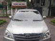 Toyota Innova 2014 - Cần bán gấp Toyota Innova sản xuất năm 2014, màu bạc