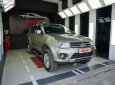 Mitsubishi Pajero 2014 - Bán ô tô Mitsubishi Pajero sản xuất 2014, màu vàng