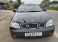 Daewoo Lacetti 2005 - Cần bán Daewoo Lacetti EX 1.6 MT sản xuất năm 2005, màu đen