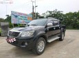 Toyota Hilux   2012 - Cần bán Toyota Hilux 3.0G 4x4 MT đời 2012, màu đen, nhập khẩu  