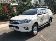 Toyota Hilux 2016 - Bán Toyota Hilux sản xuất năm 2016, màu trắng, xe nhập chính hãng