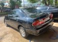 Mazda 323 1998 - Cần bán Mazda 323 đời 1998, màu đen, nhập khẩu chính hãng