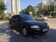 Ford Laser 2000 - Bán ô tô Ford Laser sản xuất năm 2000, màu đen xe còn mới