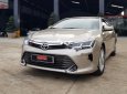 Toyota Camry 2016 - Cần bán gấp Toyota Camry đời 2016, màu nâu xe còn mới