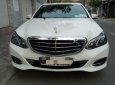 Mercedes-Benz E class 2014 - Cần bán lại xe Mercedes đời 2014, màu trắng xe còn mới nguyên