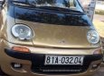 Daewoo Matiz 2000 - Cần bán xe Daewoo Matiz sản xuất 2000, màu vàng, nhập khẩu nguyên chiếc