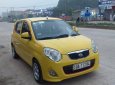 Kia Morning 2009 - Bán Kia Morning năm sản xuất 2009, màu vàng, giá 129tr