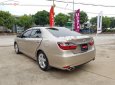 Toyota Camry 2016 - Cần bán gấp Toyota Camry đời 2016, màu nâu xe còn mới