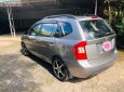 Kia Carens 2010 - Bán Kia Carens đời 2010, màu bạc xe gia đình, giá 325tr xe còn mới