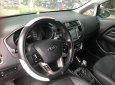 Kia Rio 1.4 2014 - Cần bán xe Kia Rio 1.4 năm sản xuất 2014, màu đỏ, nhập khẩu như mới