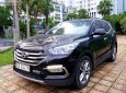 Hyundai Santa Fe 2.4L 4WD 2016 - Cần bán gấp Hyundai Santa Fe 2.4L 4WD năm 2016, màu đen, giá 895tr