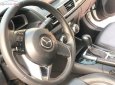 Mazda 3 2016 - Cần bán gấp Mazda 3 năm sản xuất 2016, màu trắng xe còn mới nguyên