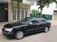 Ford Laser   2004 - Bán Ford Laser GHIA 1.8 AT sản xuất 2004, màu đen, số tự động 