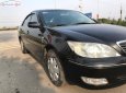 Toyota Camry 2.4G 2002 - Bán Toyota Camry 2.4G năm sản xuất 2002, màu đen số sàn 