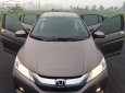 Honda City 2015 - Cần bán xe Honda City đời 2015, màu nâu, giá 390tr xe còn mới nguyên