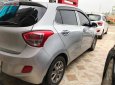 Hyundai Grand i10  1.0 MT 2015 - Cần bán gấp Hyundai Grand i10 1.0 MT năm 2015, màu bạc, nhập khẩu nguyên chiếc 