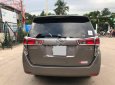 Toyota Innova 2.0E 2018 - Cần bán Toyota Innova 2.0E đời 2018, màu nâu số sàn, giá 656tr