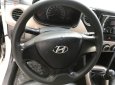 Hyundai Grand i10   2015 - Cần bán Hyundai Grand i10 1.0 MT Base đời 2015, màu bạc, xe nhập, số sàn 