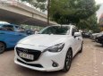 Mazda 2 1.5 AT 2015 - Xe Mazda 2 1.5 AT năm 2015, màu trắng chính chủ giá cạnh tranh