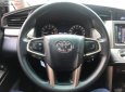 Toyota Innova 2.0E 2018 - Cần bán Toyota Innova 2.0E đời 2018, màu nâu số sàn, giá 656tr