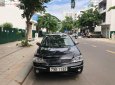 Ford Laser   2004 - Bán Ford Laser GHIA 1.8 AT sản xuất 2004, màu đen, số tự động 