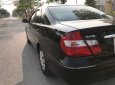 Toyota Camry 2.4G 2002 - Bán Toyota Camry 2.4G năm sản xuất 2002, màu đen số sàn 