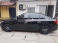 Chevrolet Cruze LT 1.6 MT 2015 - Bán ô tô Chevrolet Cruze LT 1.6 MT 2016, màu đen, giá 369tr