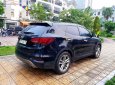 Hyundai Santa Fe 2.4L 4WD 2016 - Cần bán gấp Hyundai Santa Fe 2.4L 4WD năm 2016, màu đen, giá 895tr