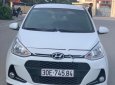 Hyundai Grand i10  1.2 AT 2016 - Cần bán lại xe Hyundai Grand i10 1.2 AT sản xuất 2016, màu trắng, nhập khẩu nguyên chiếc