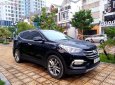 Hyundai Santa Fe 2.4L 4WD 2016 - Cần bán gấp Hyundai Santa Fe 2.4L 4WD năm 2016, màu đen, giá 895tr