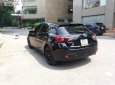 Mazda 3 1.5 AT 2015 - Cần bán gấp Mazda 3 1.5 AT sản xuất năm 2015, màu đen như mới