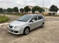 Mazda Premacy 2003 - Bán xe Mazda Premacy đời 2003, màu bạc xe còn mới nguyên