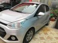 Hyundai Grand i10  1.0 MT 2015 - Cần bán gấp Hyundai Grand i10 1.0 MT năm 2015, màu bạc, nhập khẩu nguyên chiếc 