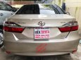 Toyota Camry   2016 - Bán xe Toyota Camry 2.0E đời 2016, màu vàng như mới