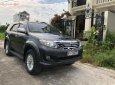 Toyota Fortuner 2014 - Cần bán Toyota Fortuner 2.7V 4x2 AT đời 2014, màu đen còn mới