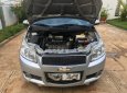 Chevrolet Aveo 2015 - Cần bán gấp Chevrolet Aveo sản xuất 2015, màu bạc