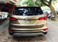 Hyundai Santa Fe 2.2L 4WD 2016 - Cần bán lại xe Hyundai Santa Fe 2.2L 4WD đời 2016, màu nâu