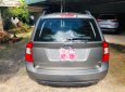 Kia Carens 2010 - Bán Kia Carens đời 2010, màu bạc xe gia đình, giá 325tr xe còn mới