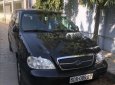 Kia Carnival GS 2.5 MT 2006 - Cần bán xe Kia Carnival GS 2.5 MT đời 2006, màu đen số sàn